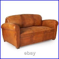 1930s French Antique Art Deco Worn Leather Sofa, converts to bed
