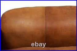 1930s French Antique Art Deco Worn Leather Sofa, converts to bed
