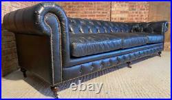 A Huge V Large Black Leather Chesterfield Sofa
