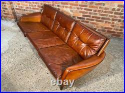 A Neat Vintage 1970s Three seater Patinated Tan Leather Sofa