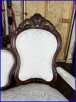 American Victorian Rococo Revival Carved And Upholstered Sofa