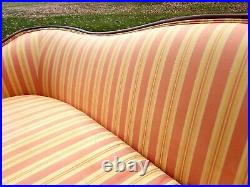 An early 20th century Hitchcock Settee in beautiful colors