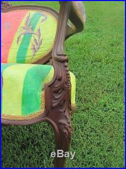 Antique Carved Mahogany Love Seat