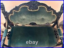 Antique Settee/Sofa/Love Seat with Lion heads in good condition