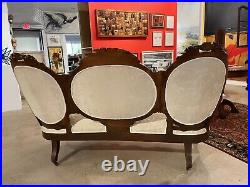 Antique Victorian Balloon Back Walnut Upholstered Open Arm Sofa