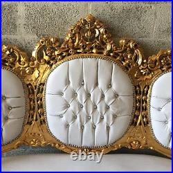 Antique sofa in Rococo style in white and gold, magnificent design and style