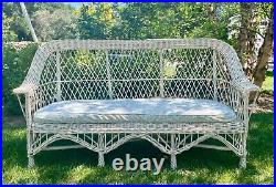 Antique white wicker couch, great condition! Removable slip-covered cushion
