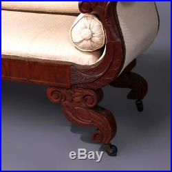 Classical American Empire Carved Flame Mahogany Scroll Form Sofa, circa 1840