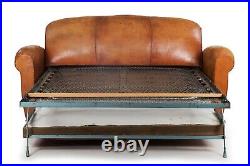 French Art Deco Worn Leather Sofa, converts to bed, circa 1930s