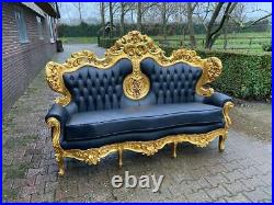 Italian style Baroque sofa with 4 chairs in black leather. 1920