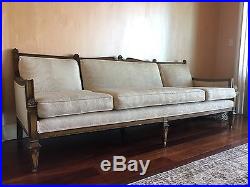 Long antique sofa couch