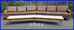 MCM Boomerang Sectional Sofa withmatching Travertine Table circa 1957