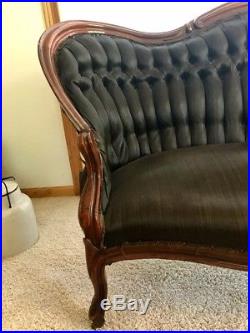 Rosewood settee (love seat) with horsehair upholstery (c. 1890). Good condition