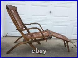 Set of antique folding wood cane reclining deck steamer chairs