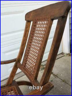 Set of antique folding wood cane reclining deck steamer chairs