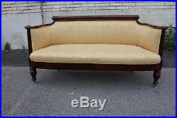 Stunning 19th C. American Empire Mahogany Love Seat, Settee, On Casters