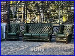 Vintage English Green Leather Chesterfield Sofa And Club Chairs