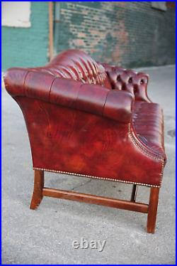 Vintage Leather Chesterfield sofa Hancock and Moore Oxblood tufted seat wood leg