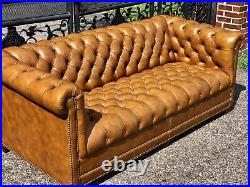 Vintage tufted leather chesterfield sofa